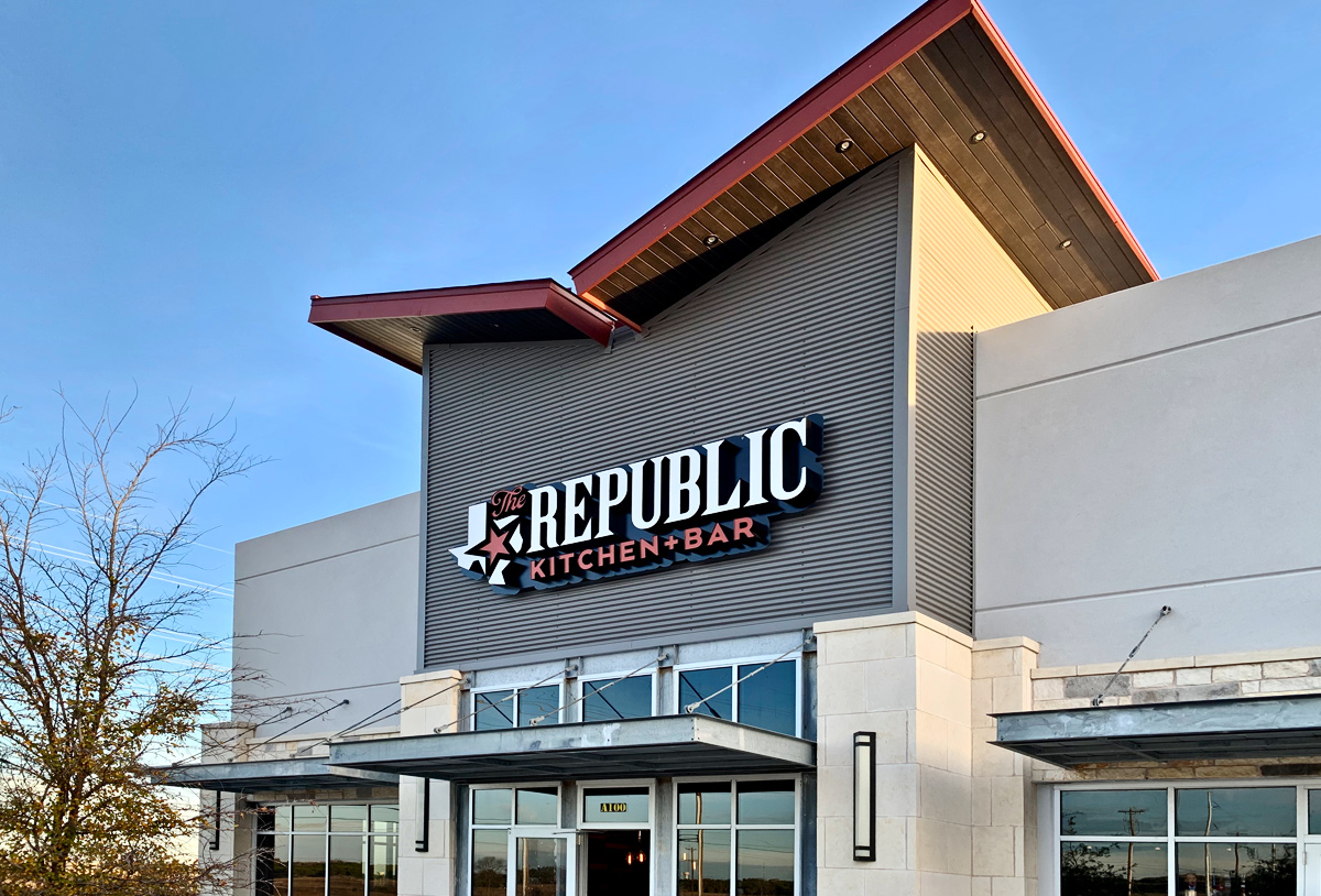 republic kitchen + bar exterior sign design by beau morrow for left hand design in austin texas